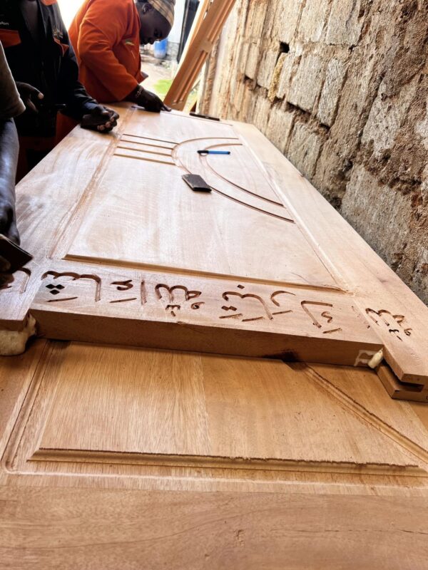 Mahogany Engraved Harwood doors.
