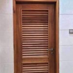 Mahogany hardwood pantry Louvered doors.