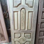 Mahogany Engraved Harwood doors.