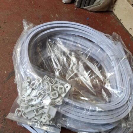 PLASTIC CURTAIN RAIL WITH FITTINGS.