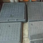 FIBER MANHOLE COVERS.