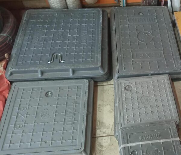 FIBER MANHOLE COVERS.